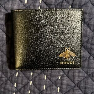 GUCCI ANIMALIER LEATHER WALLET